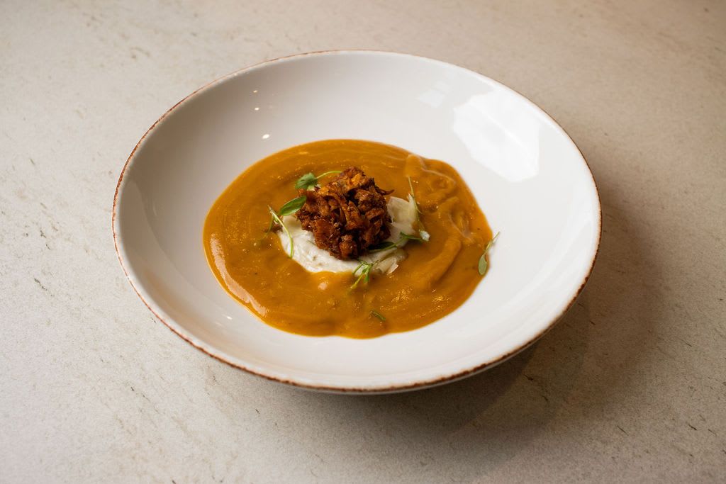 Spiced sweet potato soup topped with a crisp bhaji unwaws