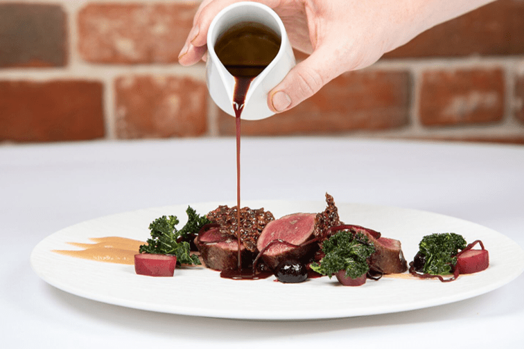 LOrtolan Review Meat Dish with Gravy Pouring