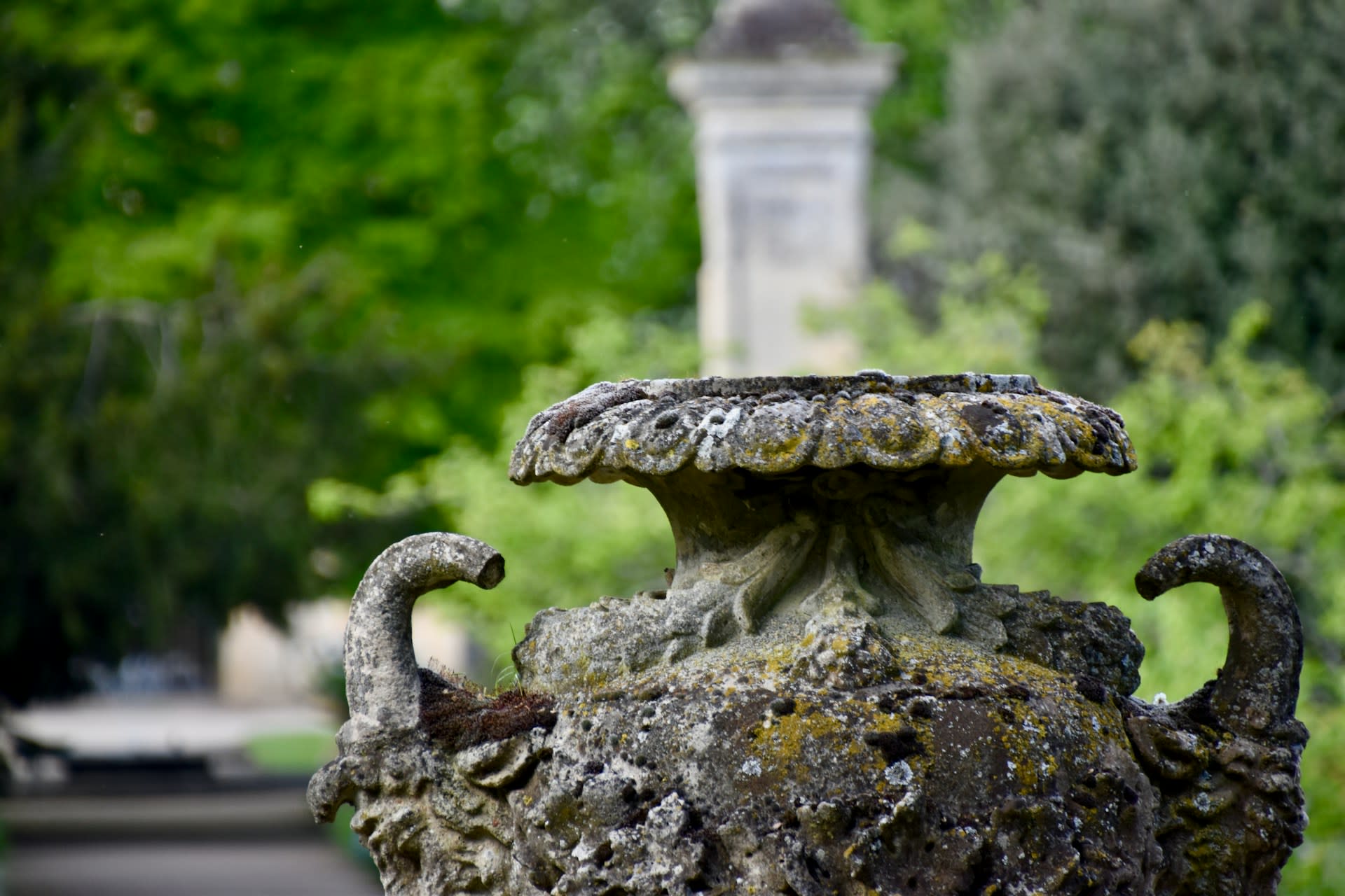 Stone urn in garden 